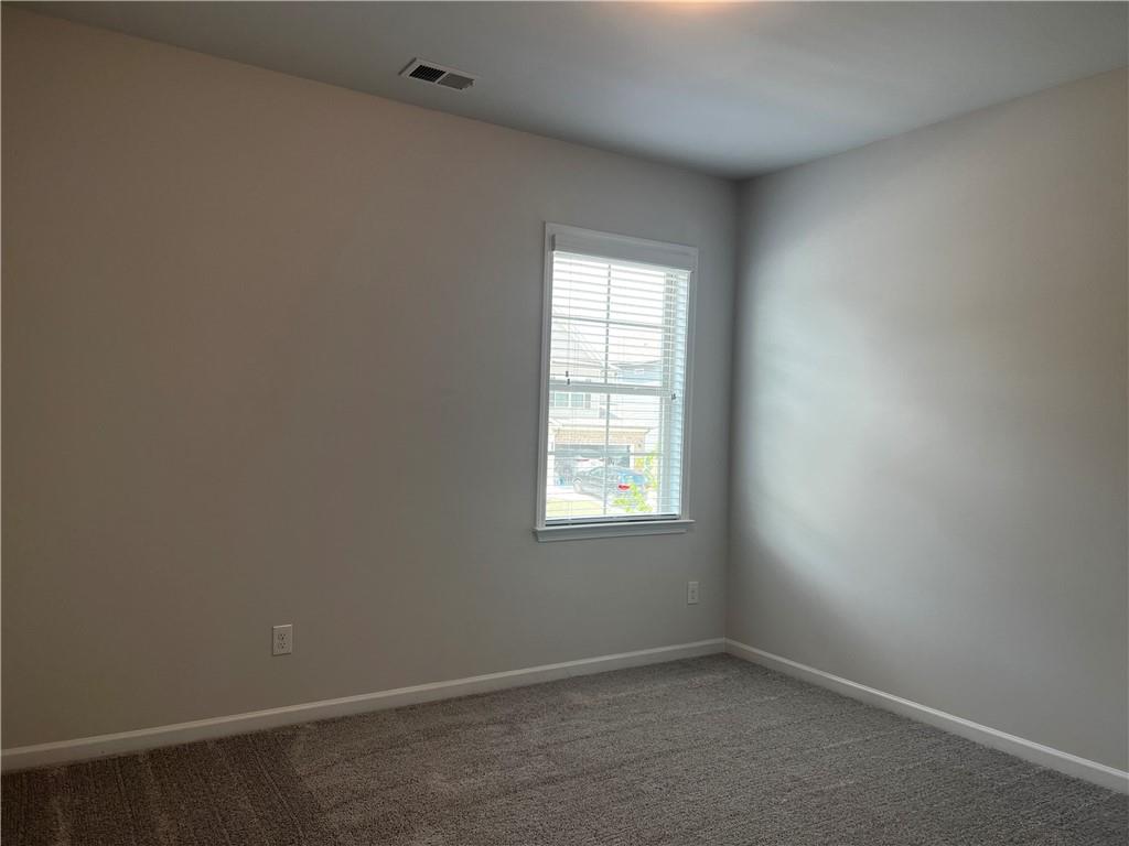 3339 Fall Branch Lane Buford, GA 30519 - Photo 16 of 30 an empty room with a window