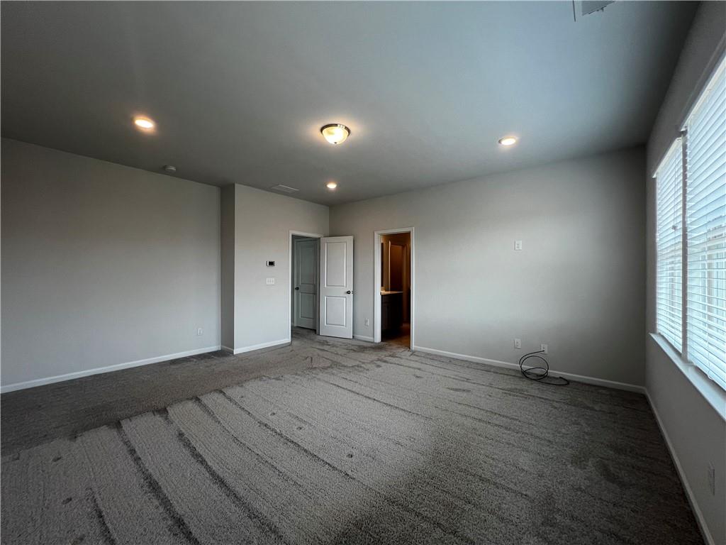 3339 Fall Branch Lane Buford, GA 30519 - Photo 19 of 30 an empty room with windows and closet