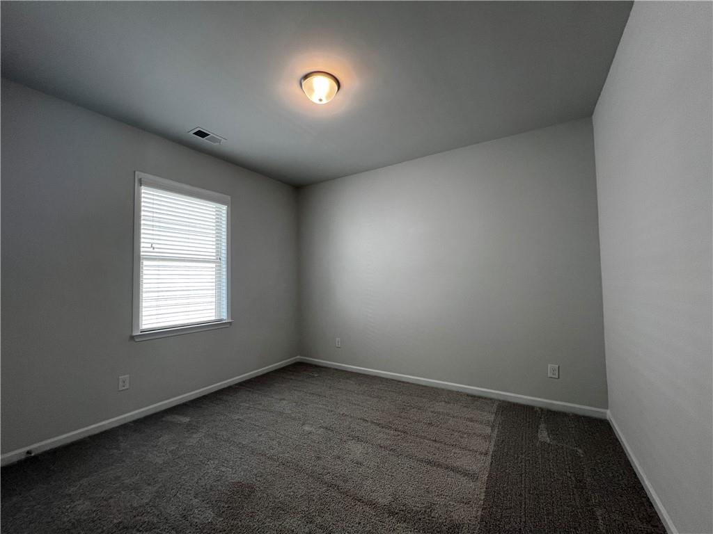 3339 Fall Branch Lane Buford, GA 30519 - Photo 24 of 30 an empty room with a window