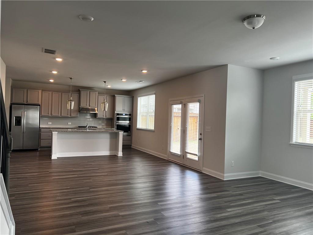 3339 Fall Branch Lane Buford, GA 30519 - Photo 6 of 30 a view of kitchen with cabinets and wooden floor