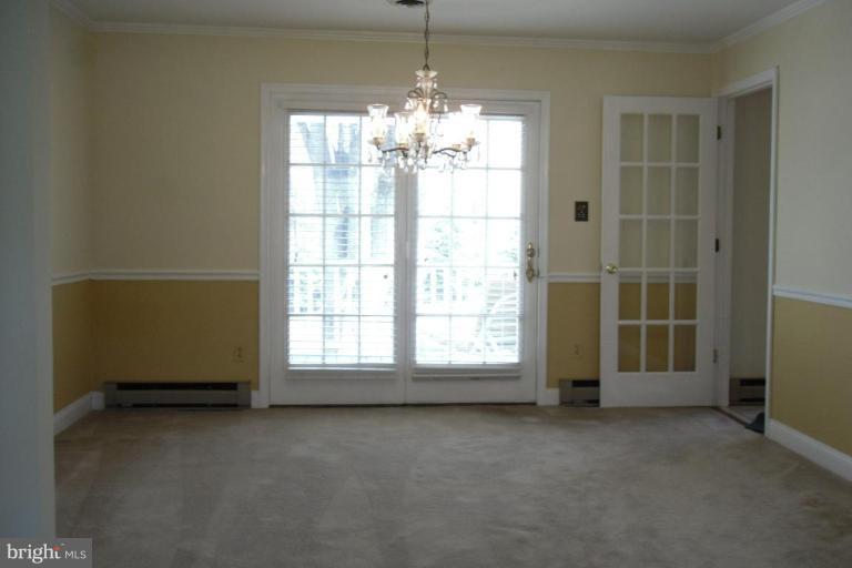 4397 Early Road Frederick, MD 21704 - Photo 14 of 30 an empty room with windows and entrance