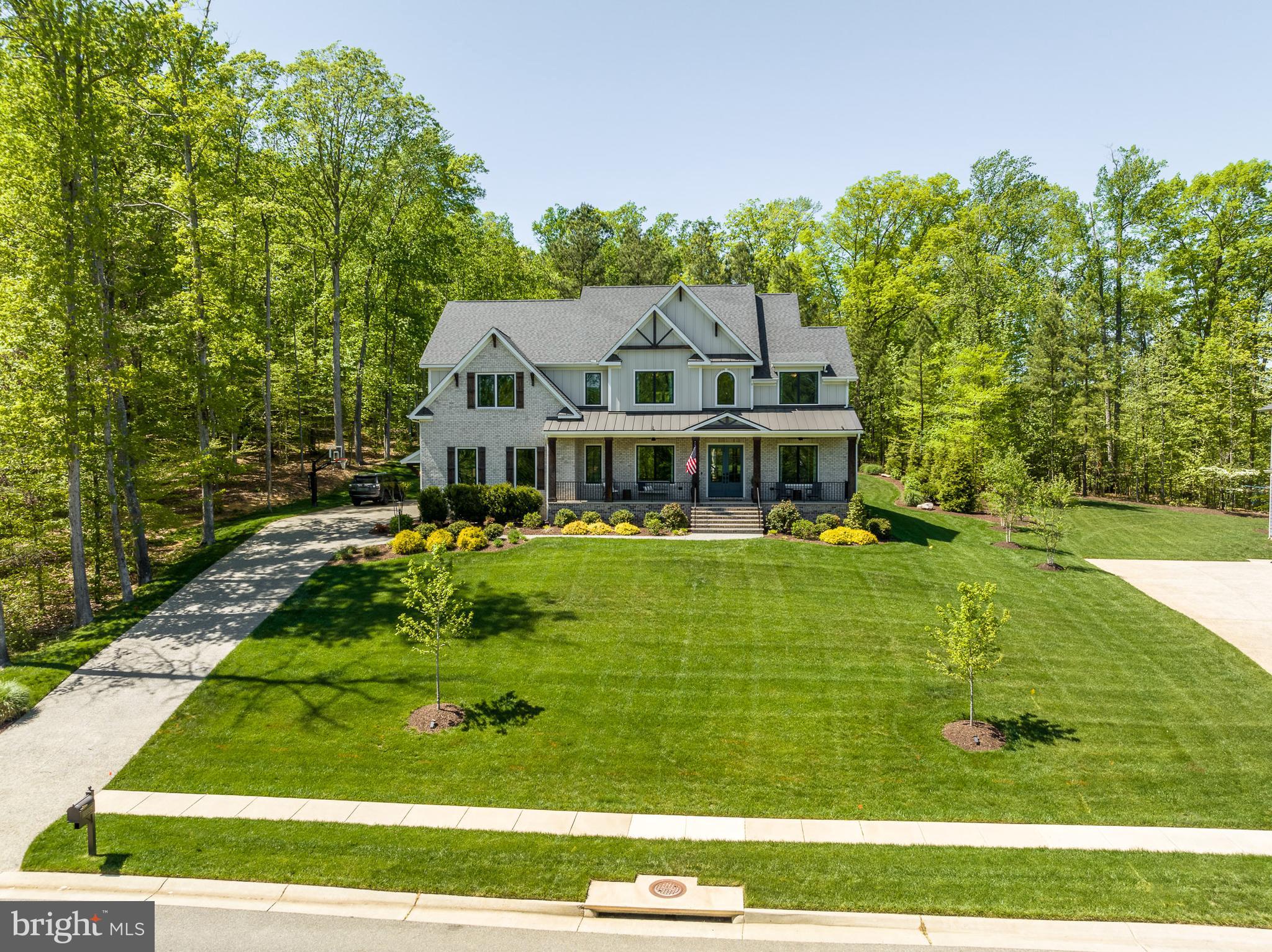 13325 Kelham Road Midlothian, VA 23113 - Photo 7 of 109 a house with swimming pool in front of it