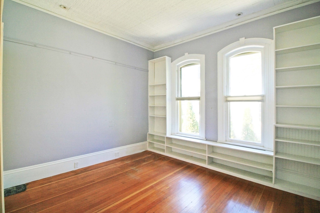 76 Crescent Street, Unit 2 Northampton, MA 01060 - Photo 11 of 25 wooden floor in an empty room with a window