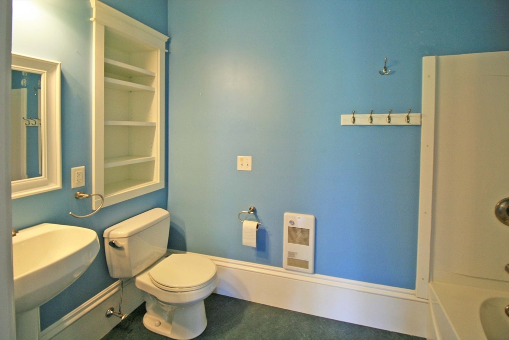 76 Crescent Street, Unit 2 Northampton, MA 01060 - Photo 20 of 25 a bathroom with a toilet and a shower