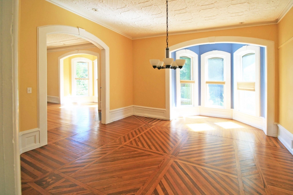 76 Crescent Street, Unit 2 Northampton, MA 01060 - Photo 2 of 25 a view of a hallway with wooden floor and entryway