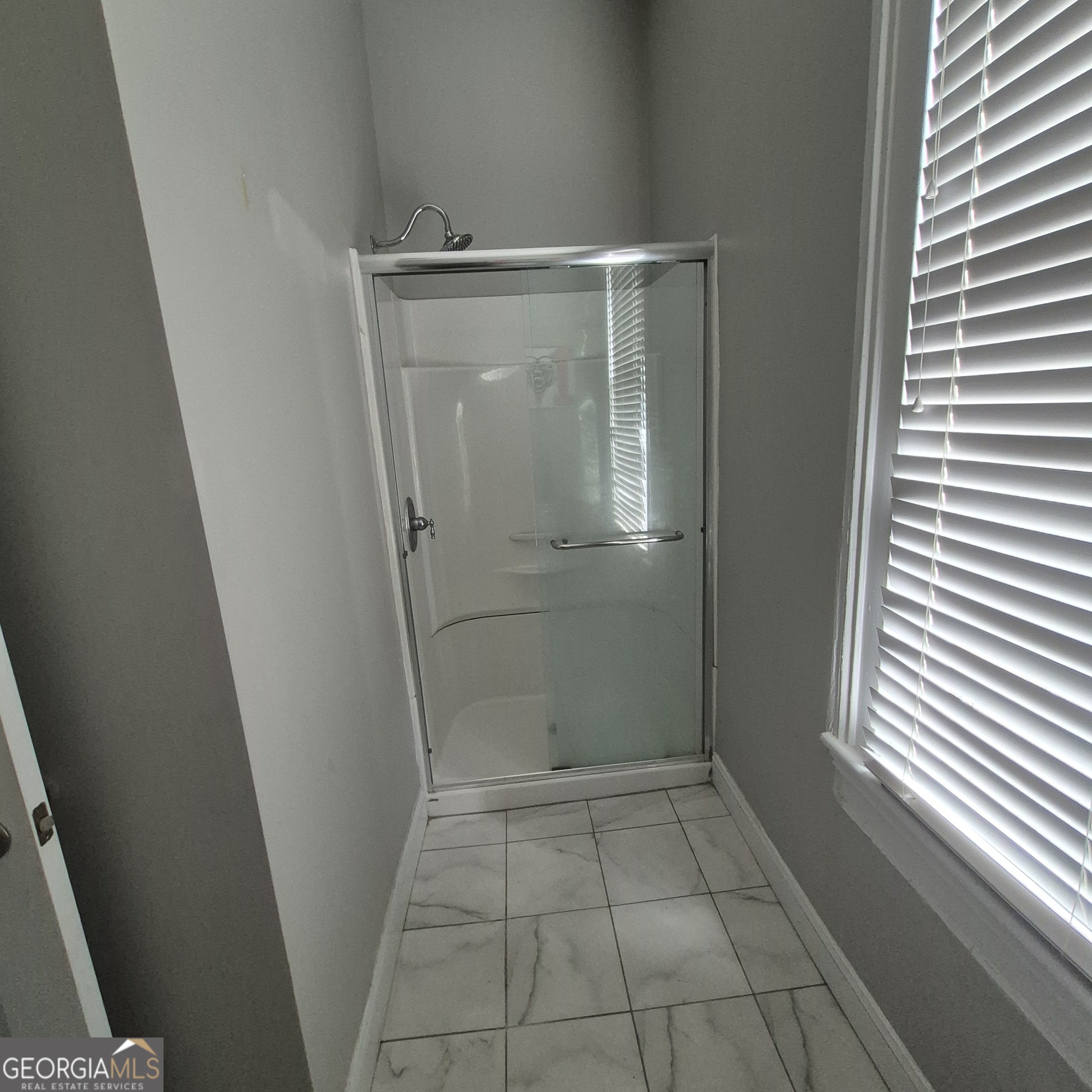867 Orange Terrace, Unit B Macon, GA 31201 - Photo 14 of 14 a view of a bathroom with a sink