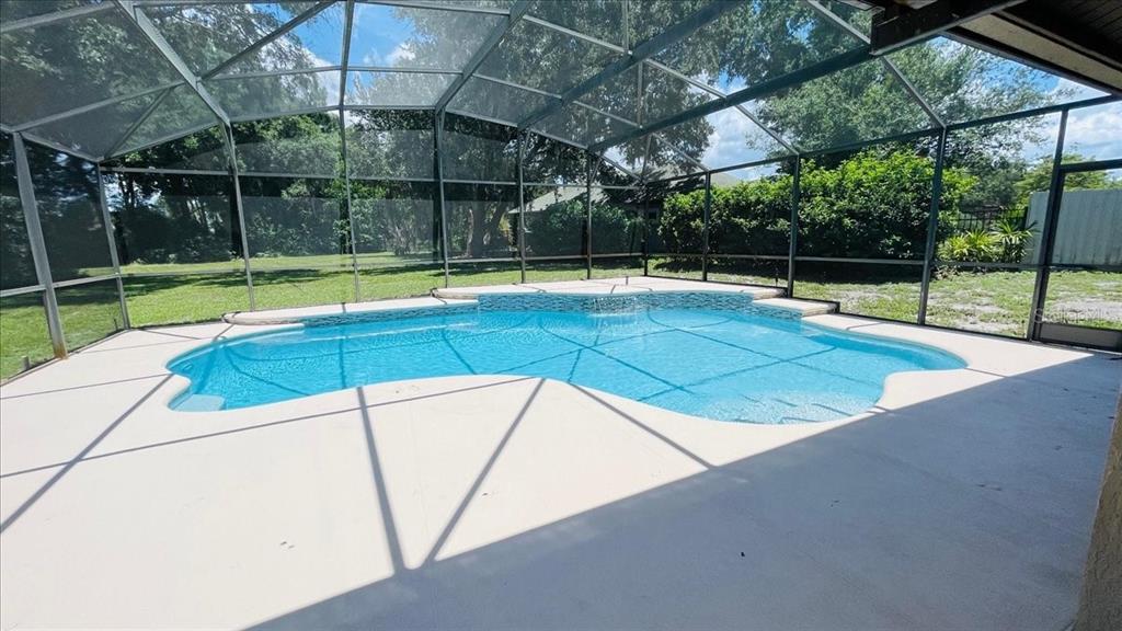 3443 Wild Myrtle Court Windermere, FL 34786 - Photo 24 of 32 a view of a backyard with swimming pool
