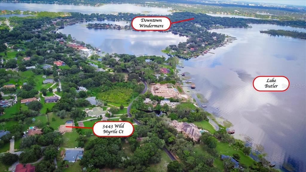 3443 Wild Myrtle Court Windermere, FL 34786 - Photo 3 of 32 an aerial view of a residential house with outdoor space and trees all around