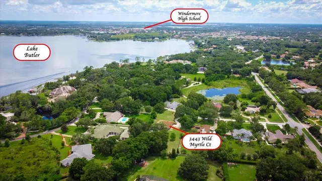 a view of a street with flower plants