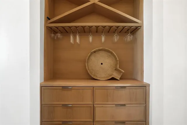 a front view of a house with wooden floor