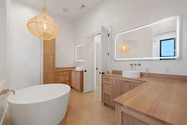 a bathroom with a toilet and a sink