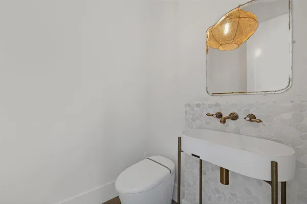 a bathroom with a sink and a vanity