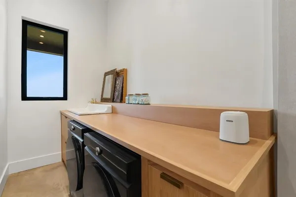 a front view of house with outdoor seating