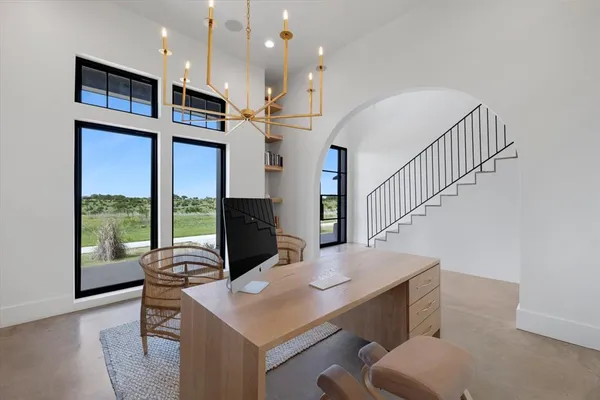 a kitchen with a sink cabinets and window