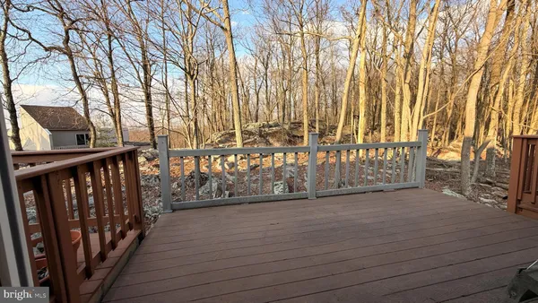 a view of entryway with wooden fence