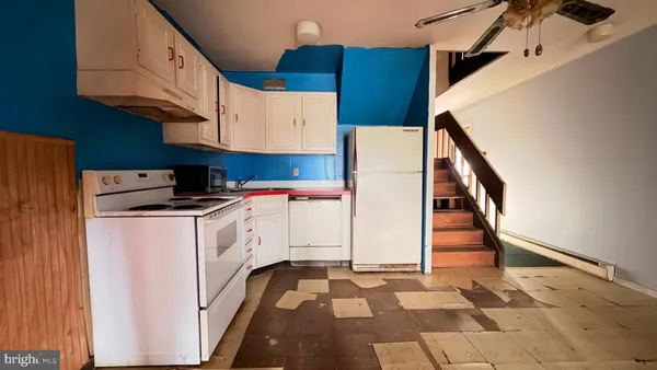 a utility room with cabinets