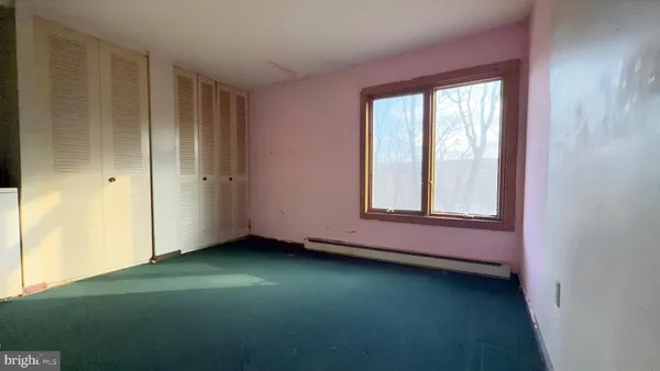 a view of an empty room with window