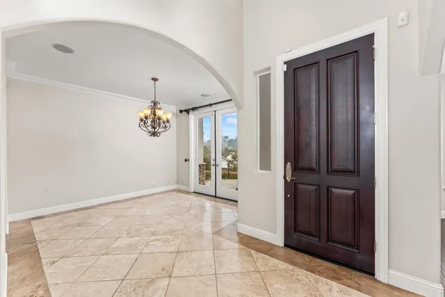 a kitchen with stainless steel appliances granite countertop a sink and cabinets