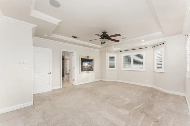 a view of a house with backyard patio and sitting area