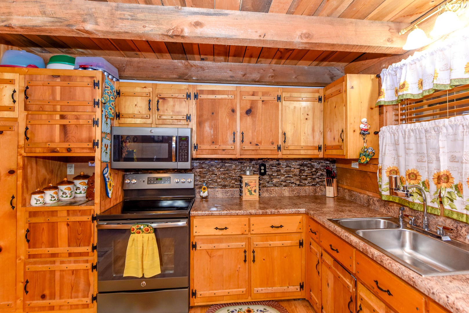 4433 Morganton Road Maryville, TN 37801 - Photo 16 of 40 a kitchen with stainless steel appliances a stove and a sink