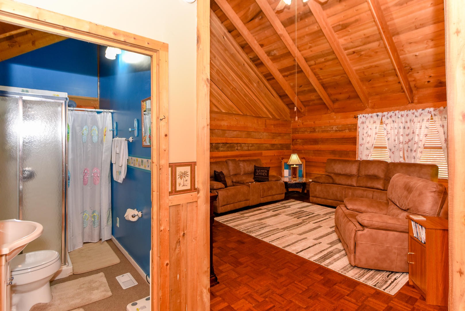 4433 Morganton Road Maryville, TN 37801 - Photo 19 of 40 a large bedroom with a bed and wooden floor