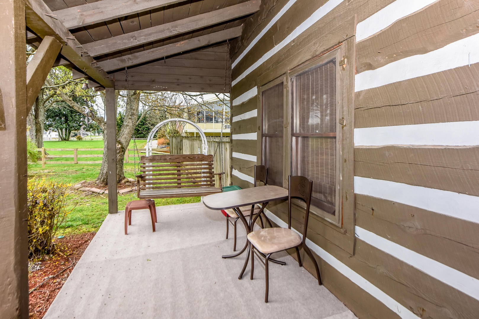 4433 Morganton Road Maryville, TN 37801 - Photo 4 of 40 a view of a porch with chairs and backyard