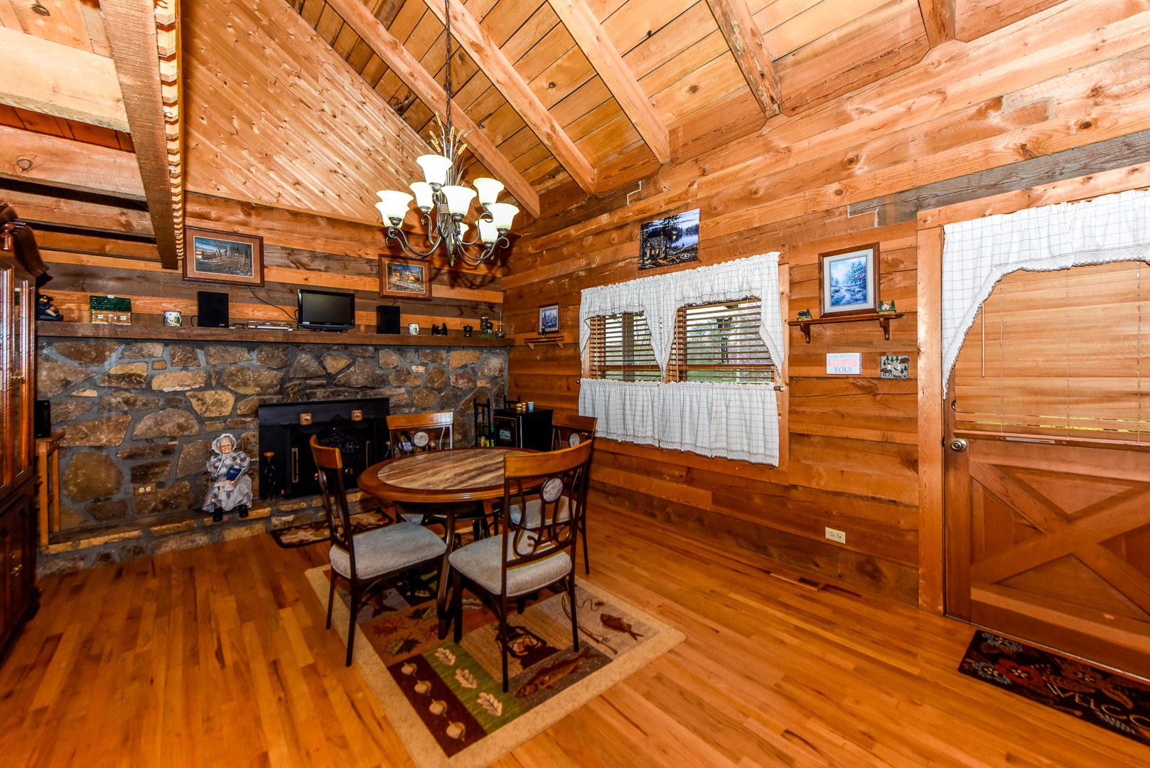 4433 Morganton Road Maryville, TN 37801 - Photo 6 of 40 a view of a chairs and table on the wooden floor