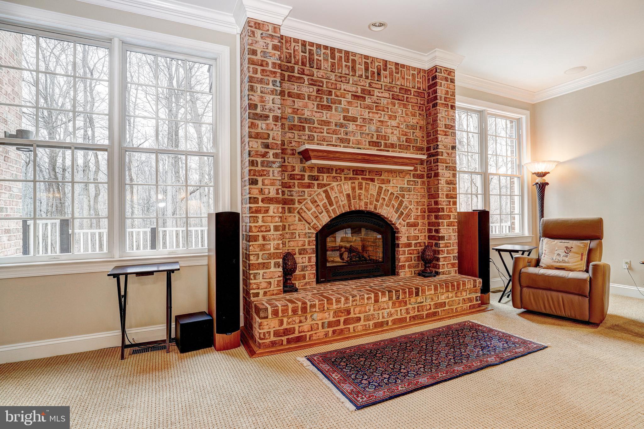 17420 Wesley Chapel Road Monkton, MD 21111 - Photo 14 of 76 a living room with furniture and a fireplace