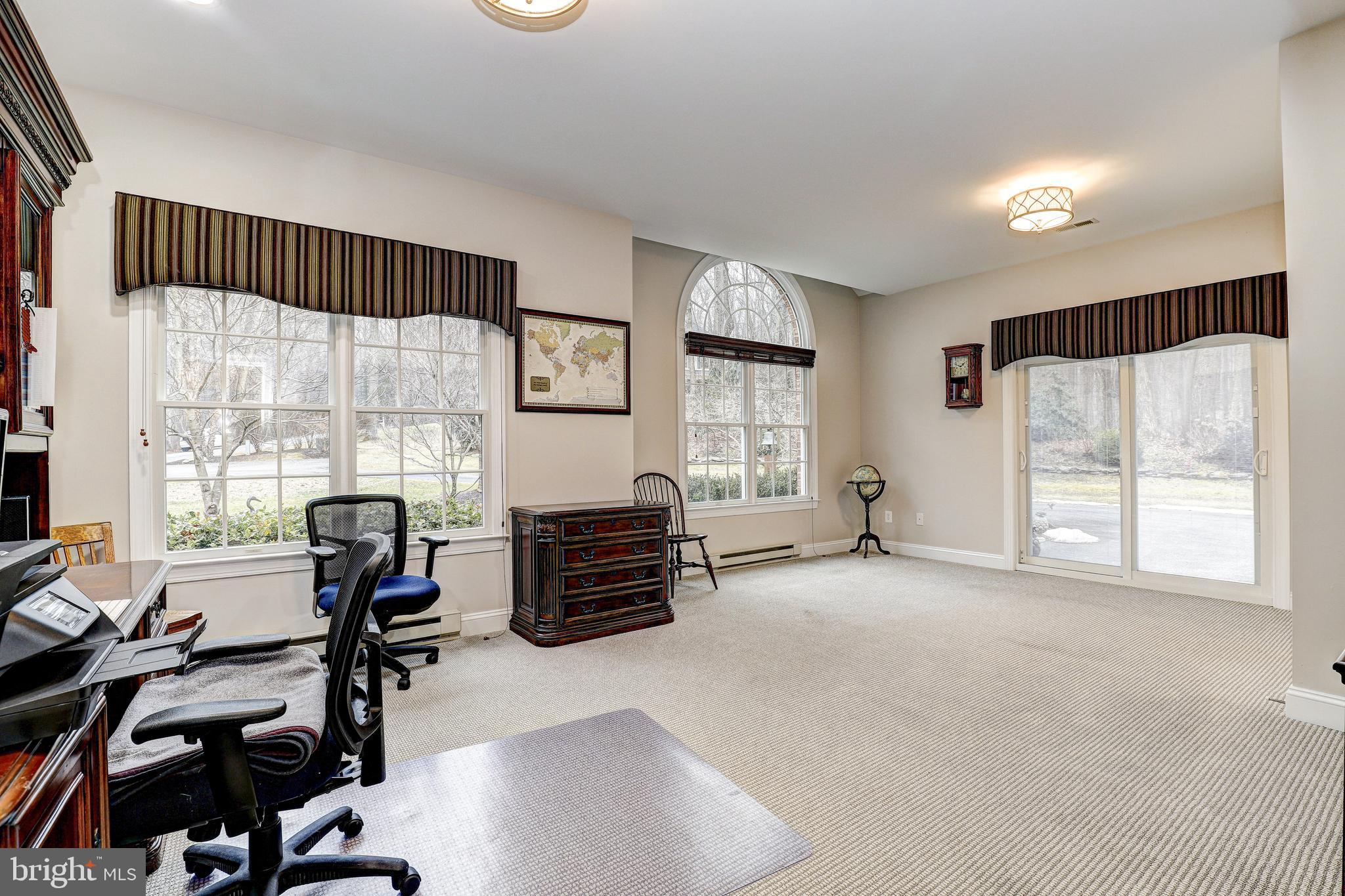 17420 Wesley Chapel Road Monkton, MD 21111 - Photo 21 of 76 a view of a workspace with furniture and a window