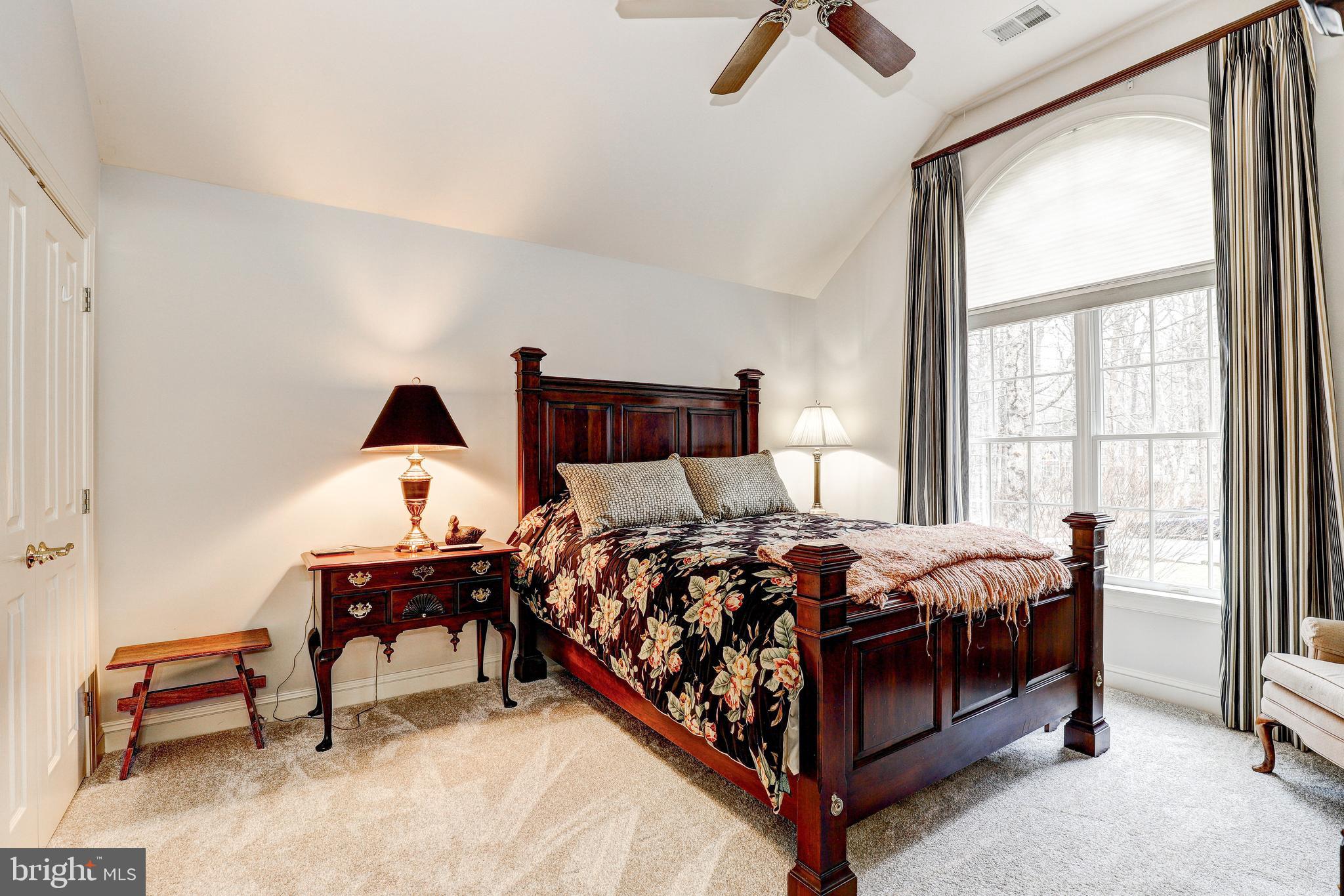 17420 Wesley Chapel Road Monkton, MD 21111 - Photo 33 of 76 a bed room with a bed and a chair