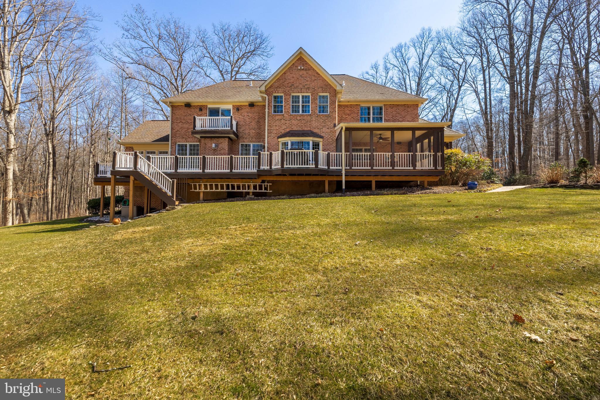 17420 Wesley Chapel Road Monkton, MD 21111 - Photo 4 of 76 a front view of a house with a yard covered with snow