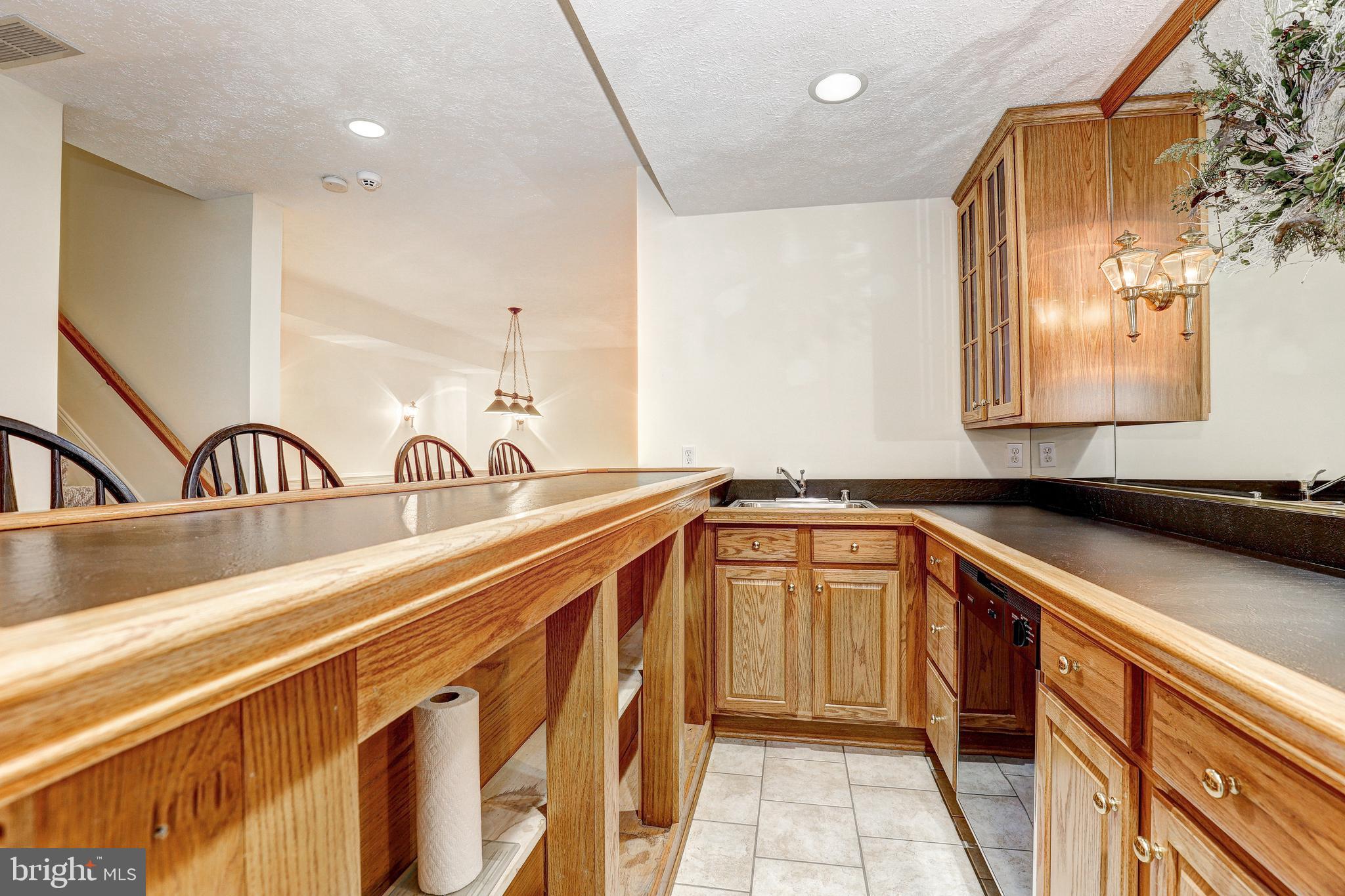 17420 Wesley Chapel Road Monkton, MD 21111 - Photo 44 of 76 a kitchen with a sink and cabinets