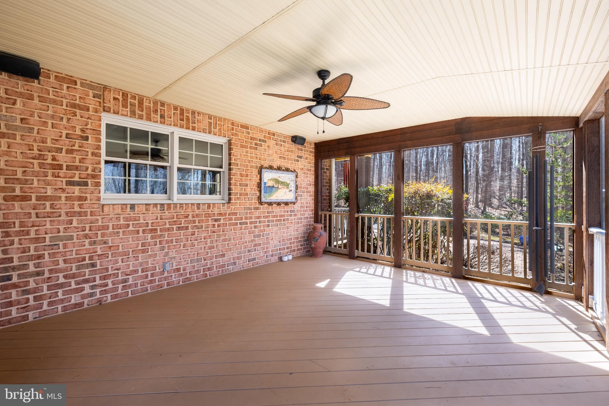 17420 Wesley Chapel Road Monkton, MD 21111 - Photo 50 of 76 a view of a porch with wooden floor and outdoor space