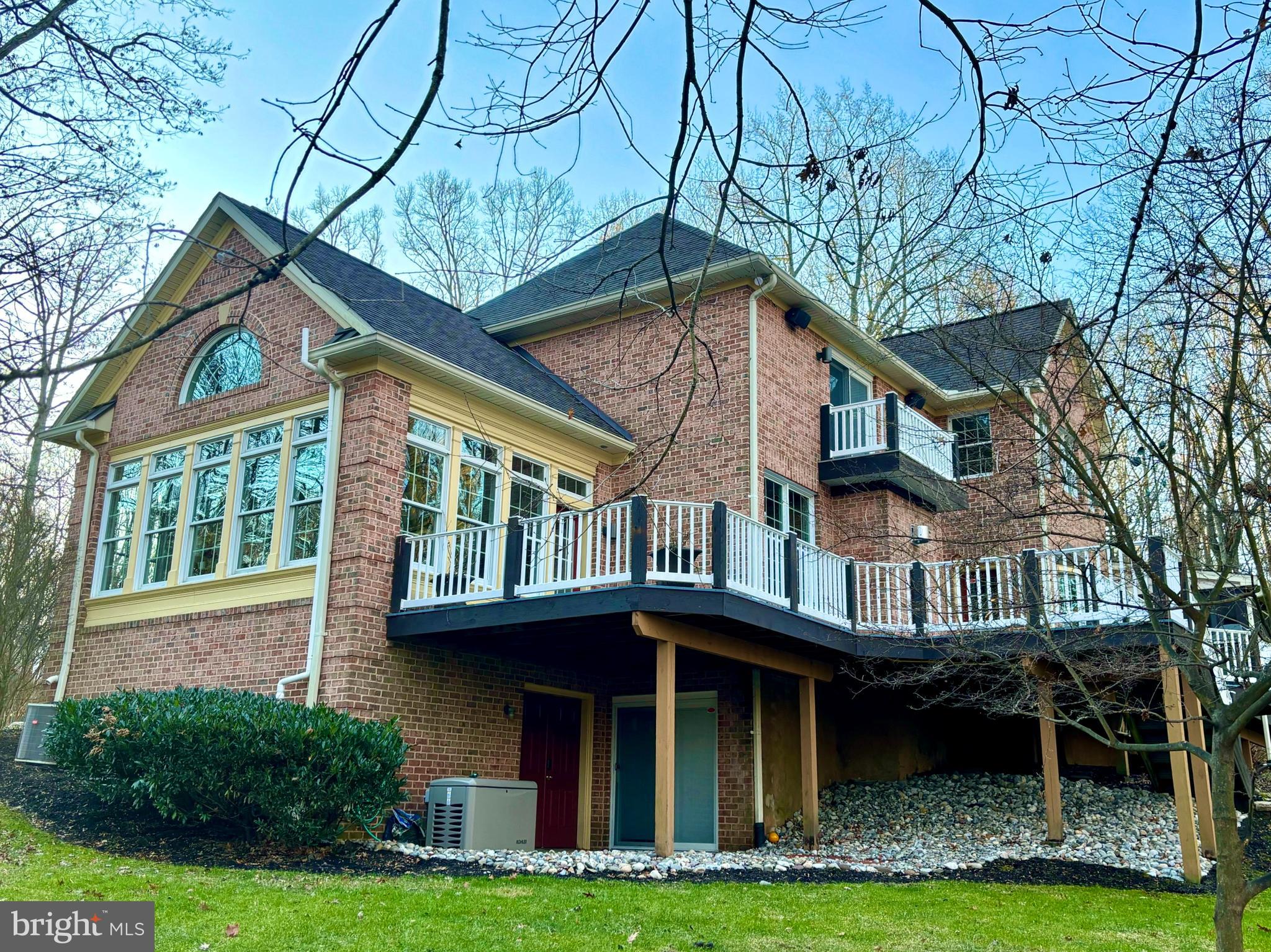 17420 Wesley Chapel Road Monkton, MD 21111 - Photo 55 of 76 a front view of a house with a yard and potted plants