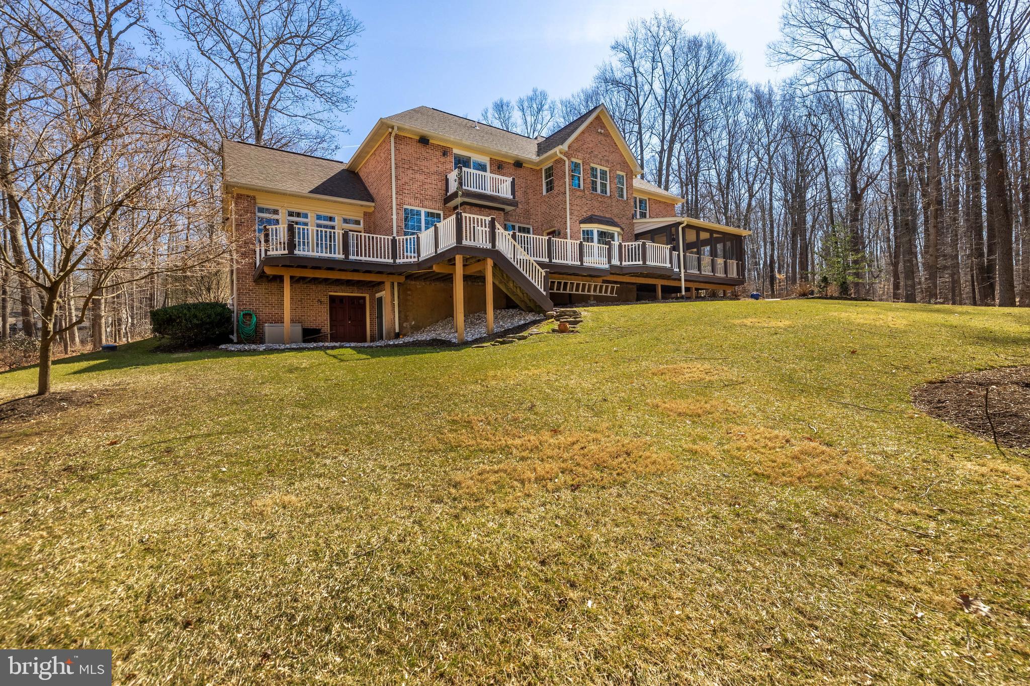 17420 Wesley Chapel Road Monkton, MD 21111 - Photo 67 of 76 a front view of residential houses with yard and trees