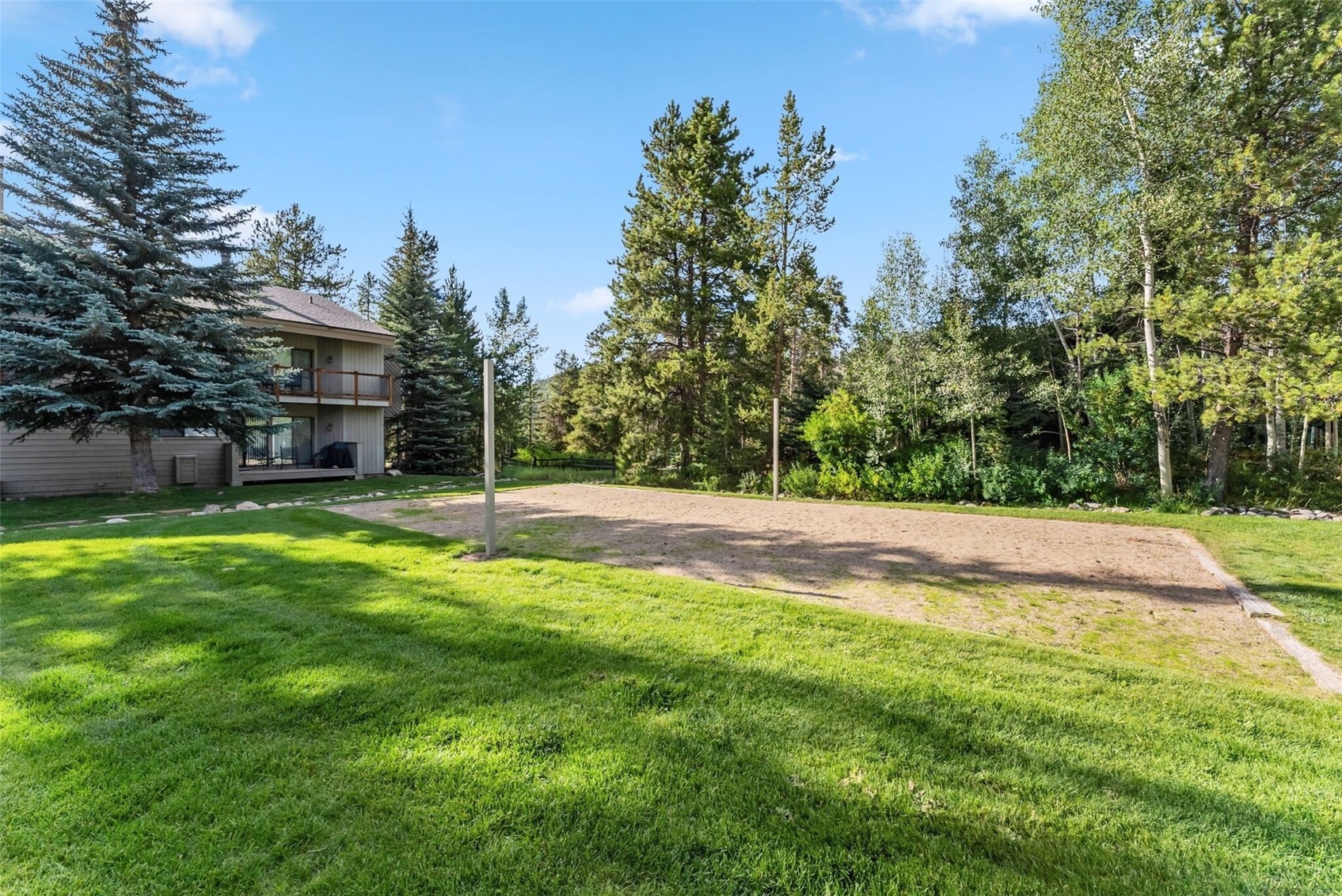 1937 Soda Ridge Road, Unit 1130 Dillon, CO 80435 - Photo 23 of 25 a view of a house with a backyard