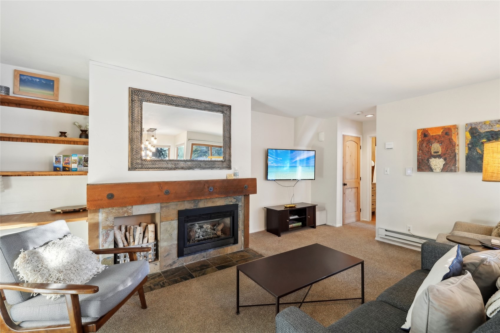 1937 Soda Ridge Road, Unit 1130 Dillon, CO 80435 - Photo 8 of 23 a living room with furniture and a fireplace