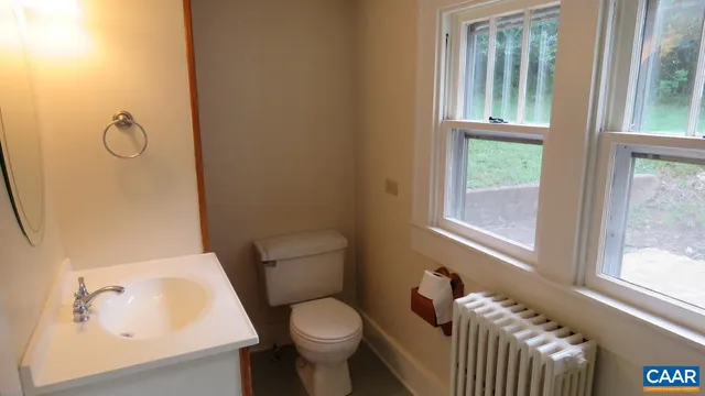a bathroom with a sink and toilet