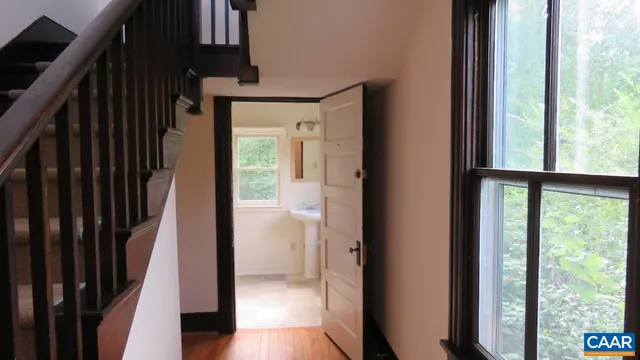 a view of hallway with stairs