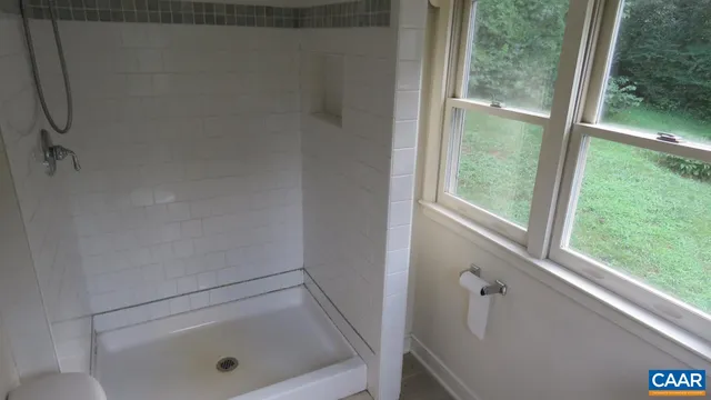 a bathroom with a sink and a shower