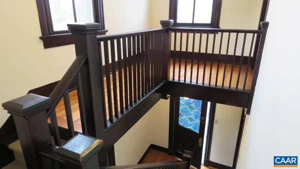 a view of entryway with wooden floor