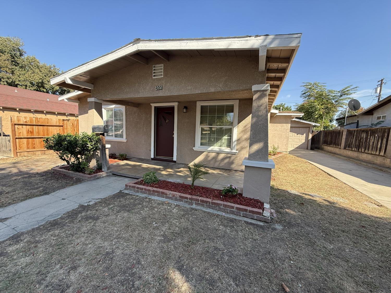 405 Colorado Avenue Modesto, CA 95351 - Photo 1 of 33 a view of a house with porch and furniture