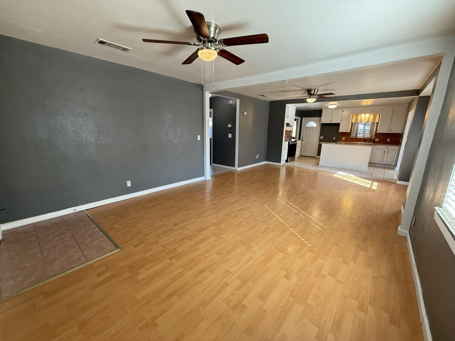 405 Colorado Avenue Modesto, CA 95351 - Photo 11 of 33 a view of empty room with wooden floor