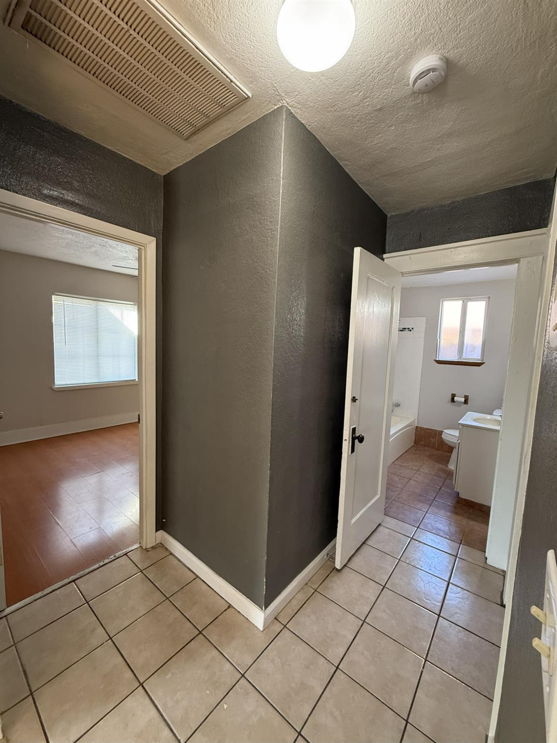 405 Colorado Avenue Modesto, CA 95351 - Photo 18 of 33 a bathroom with a sink and a mirror