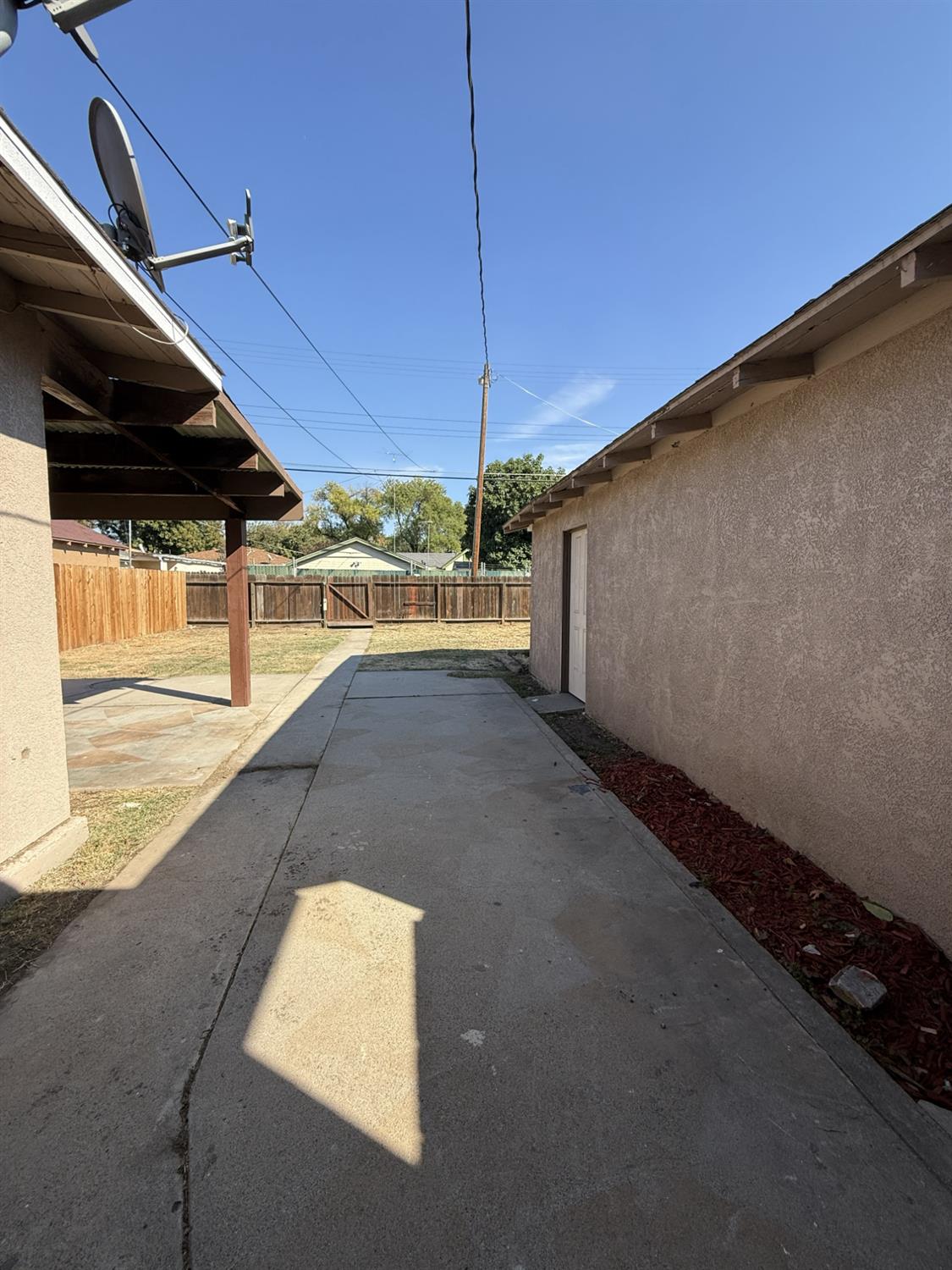 405 Colorado Avenue Modesto, CA 95351 - Photo 27 of 33 a view of a backyard of a house