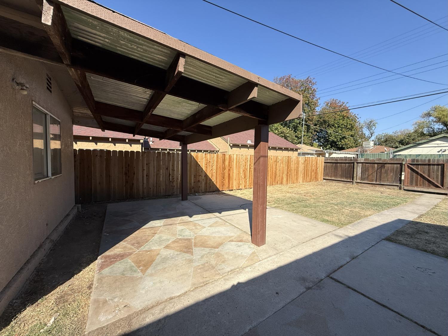 405 Colorado Avenue Modesto, CA 95351 - Photo 28 of 33 a view of a backyard of the house