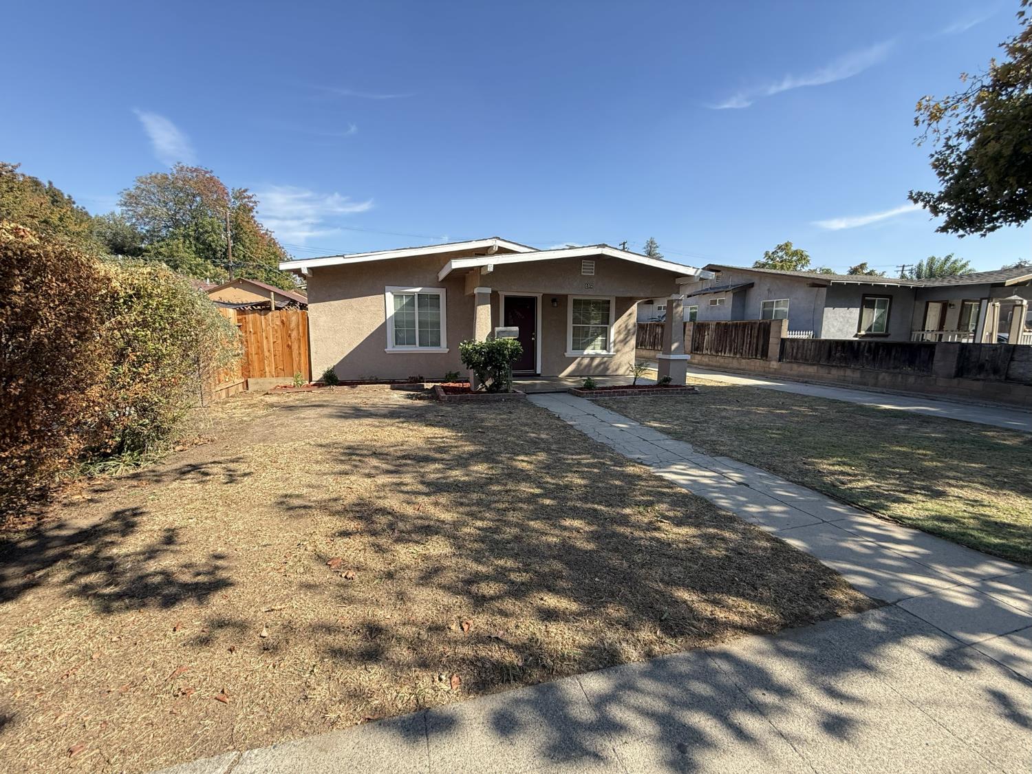 405 Colorado Avenue Modesto, CA 95351 - Photo 3 of 33 a view of a house with a yard