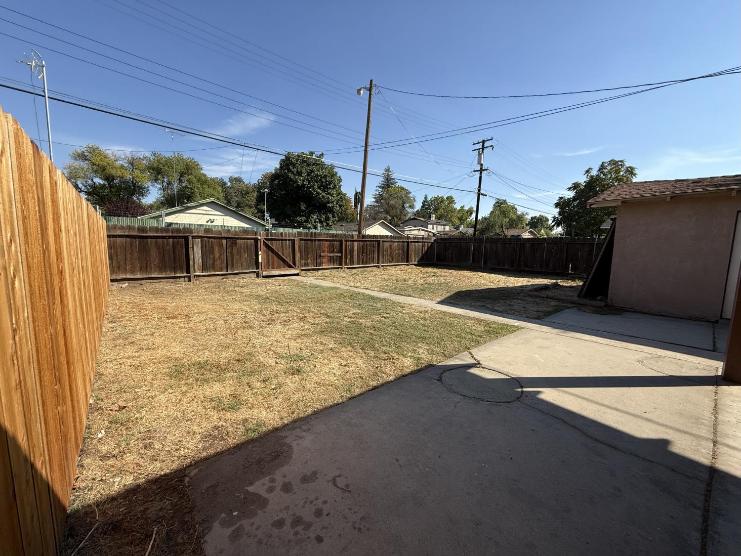 405 Colorado Avenue Modesto, CA 95351 - Photo 31 of 33 a view of a house with a backyard
