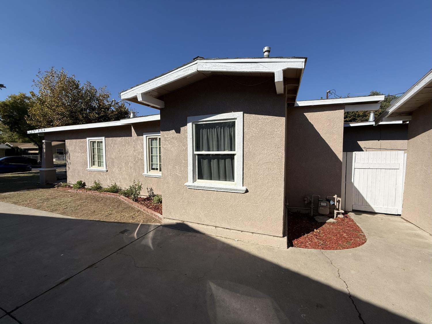 405 Colorado Avenue Modesto, CA 95351 - Photo 6 of 33 a front view of a house with yard