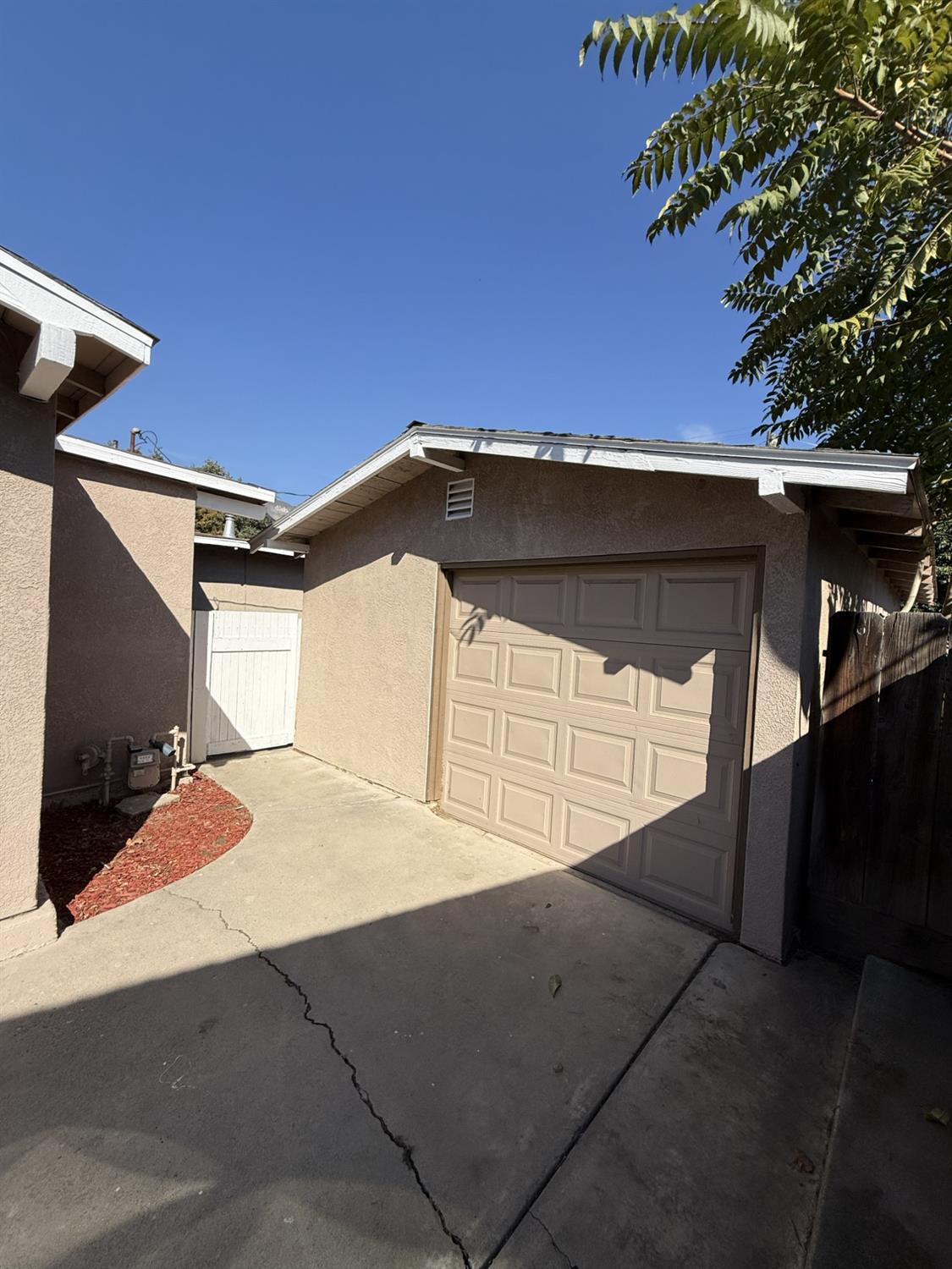 405 Colorado Avenue Modesto, CA 95351 - Photo 7 of 33 a view of garage with car parked